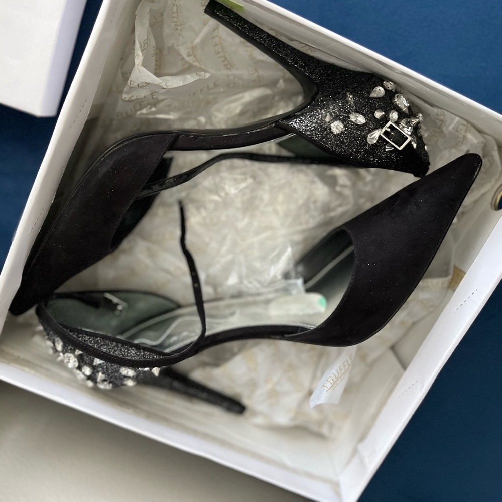 Black with rhinestones and glitter high heels. Size 8.5/8 1/2